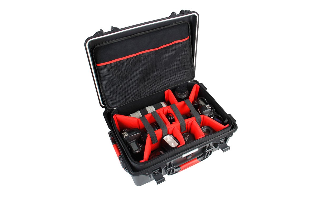 Travel case with custom foam insert and rolling handle